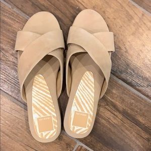 Dolce Vita tan flat slides.